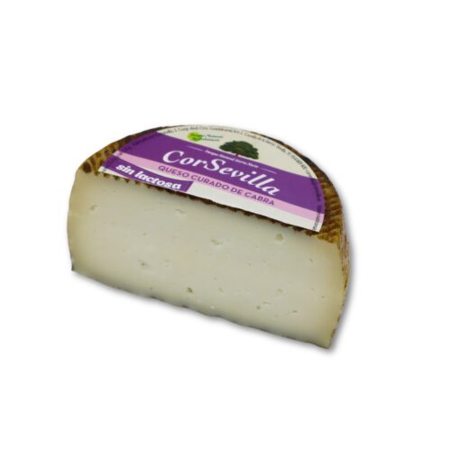 la mitad de un queso curado sin lactosa de cabra
